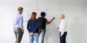 Engineers working on a project together